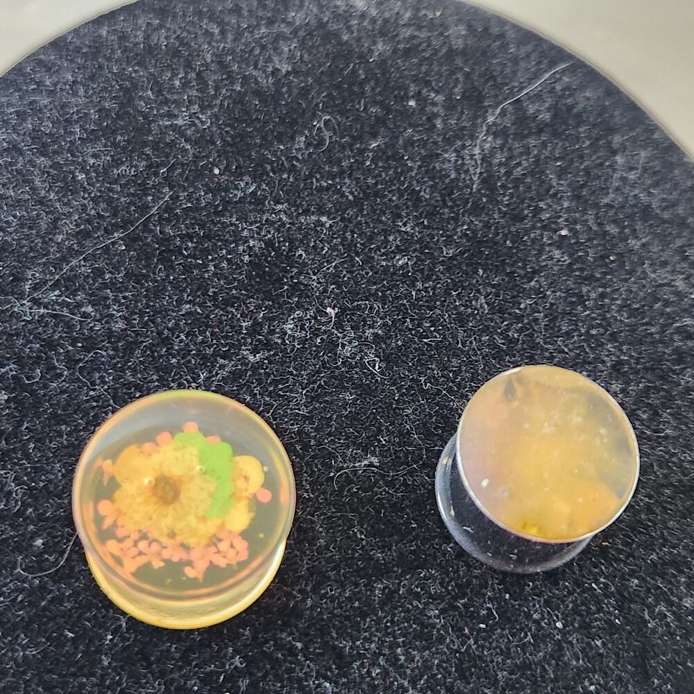 Used 9mm ear plug floral